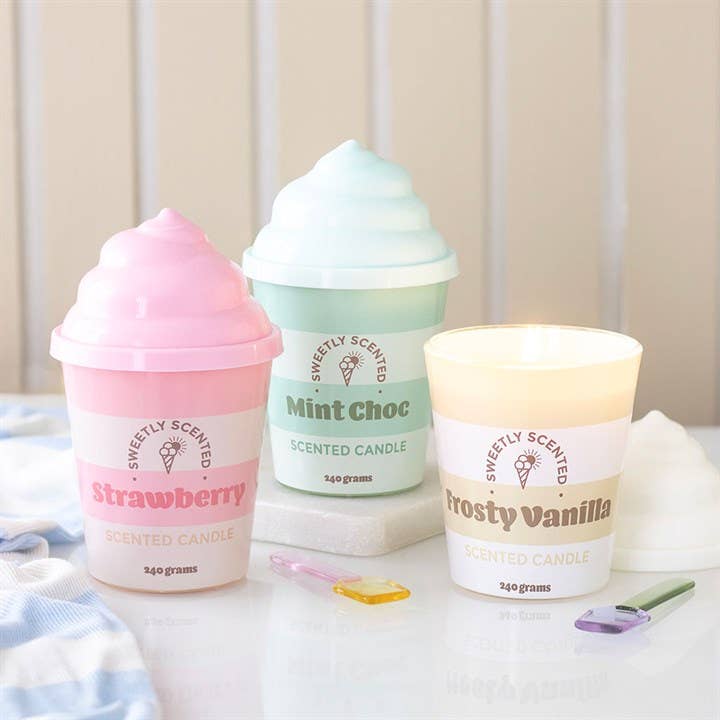 Ice cream candle trio with Frosty Vanilla lit in styled setting