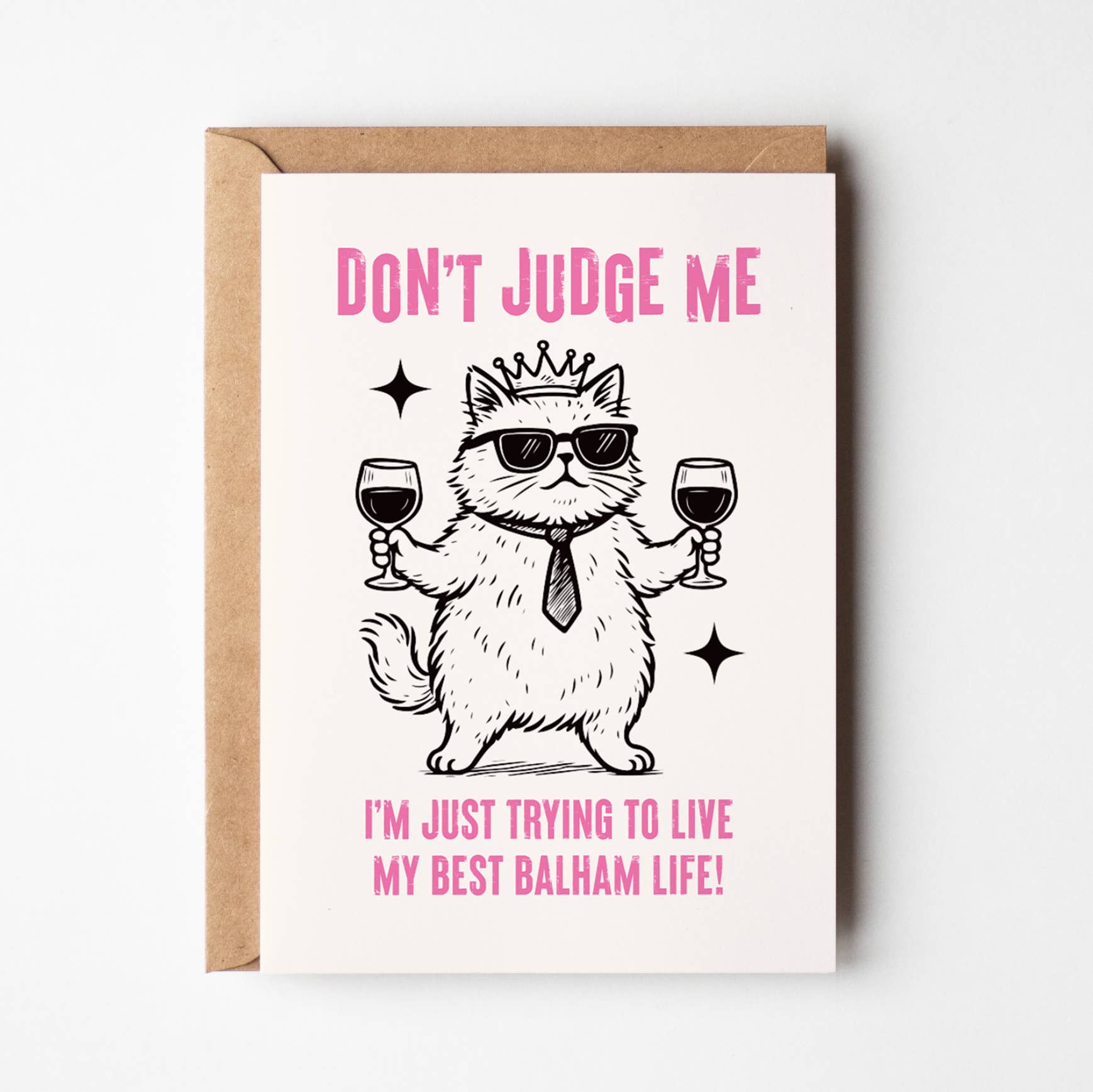 Cat card reading Don't Judge Me with a crowned cat and two wine glasses