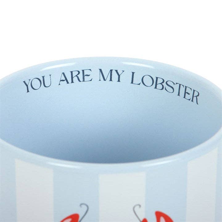 Side view of nautical blue and white striped mug
