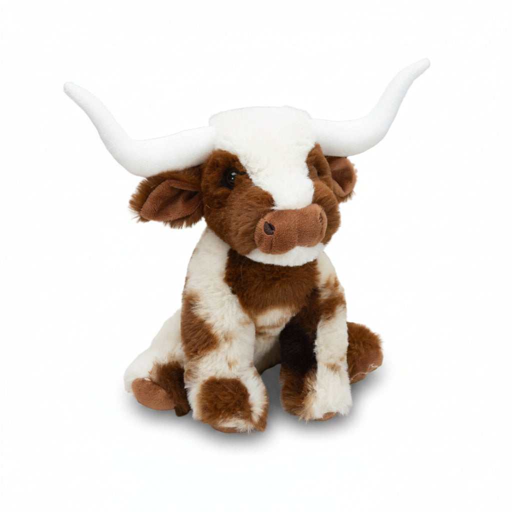 Texas Longhorn medium soft toy cow sitting on grey background