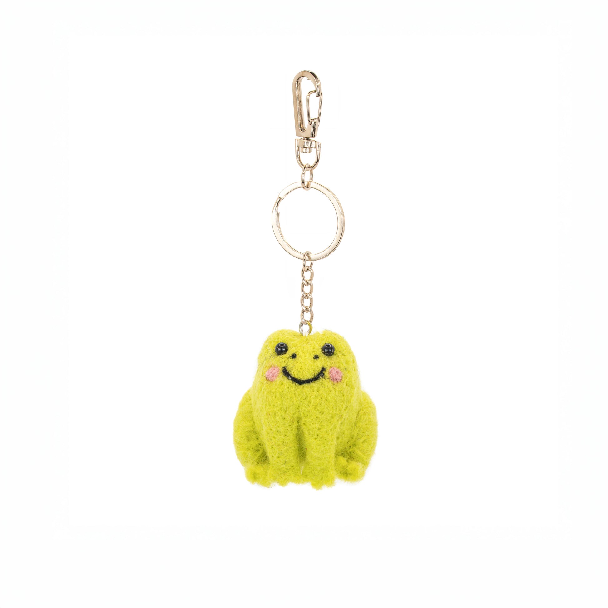 Handcrafted frog keyring showing soft felt body and detailed stitching