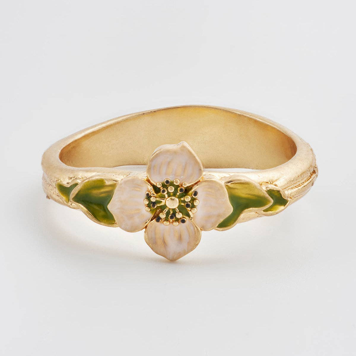 Close up of the hand-painted white anemone flower and gold centre