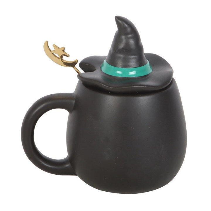 Back view of Bad Witch mug showing witch hat lid and gold spoon.