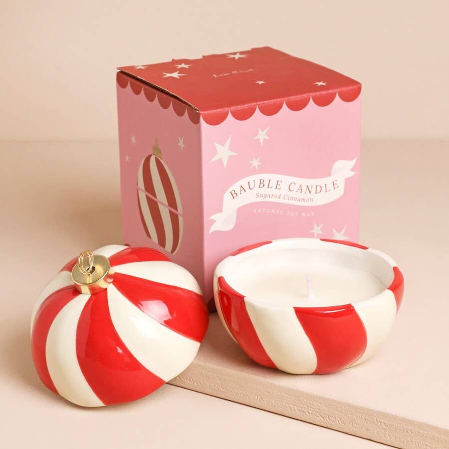 Candy Cane Stripe Cinnamon Bauble Candle with pink gift box, lid open to reveal wax candle inside.