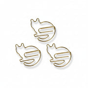 Set of 5 gold cat-shaped paper clips arranged on white background.