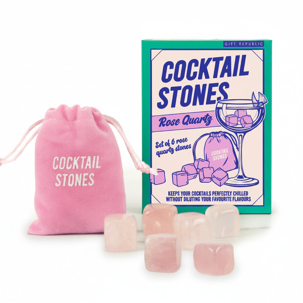 Front view of rose quartz cocktail stones set with six pink crystal cubes, pink velvet drawstring pouch, and illustrated gift box packaging.