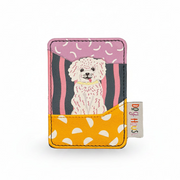 Flat lay of Dog House Dog Card Holder with illustrated dog and yellow polka dot pocket.