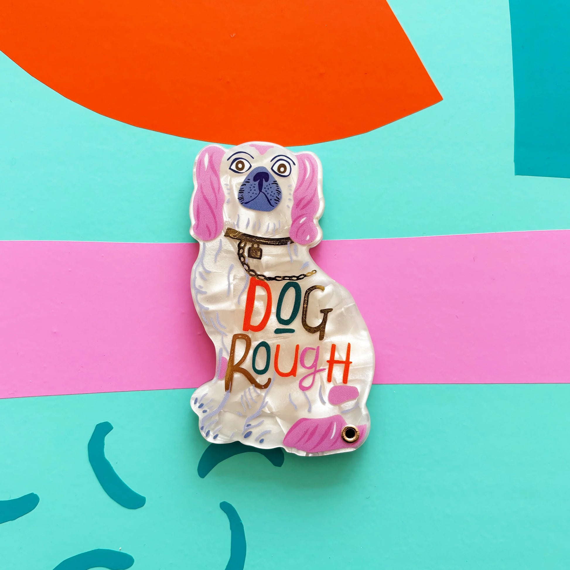 Close-up of Dog House Dog Rough Compact Mirror showing pink-eared spaniel and pearlescent finish.