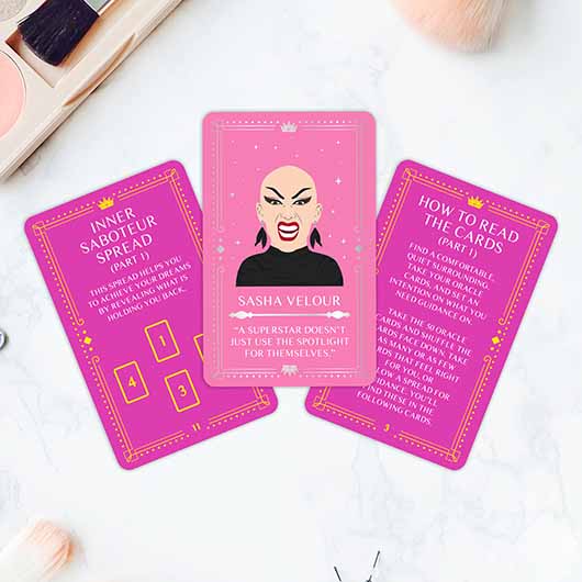 Drag Queen Oracles quote and guidance cards spread out for reading.