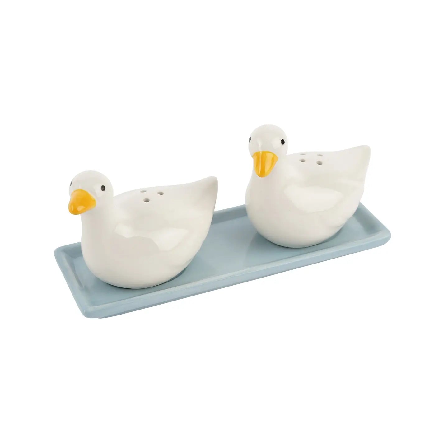 Side angle of duck salt and pepper shakers showing fine detail on wings and beak with glossy white finish.