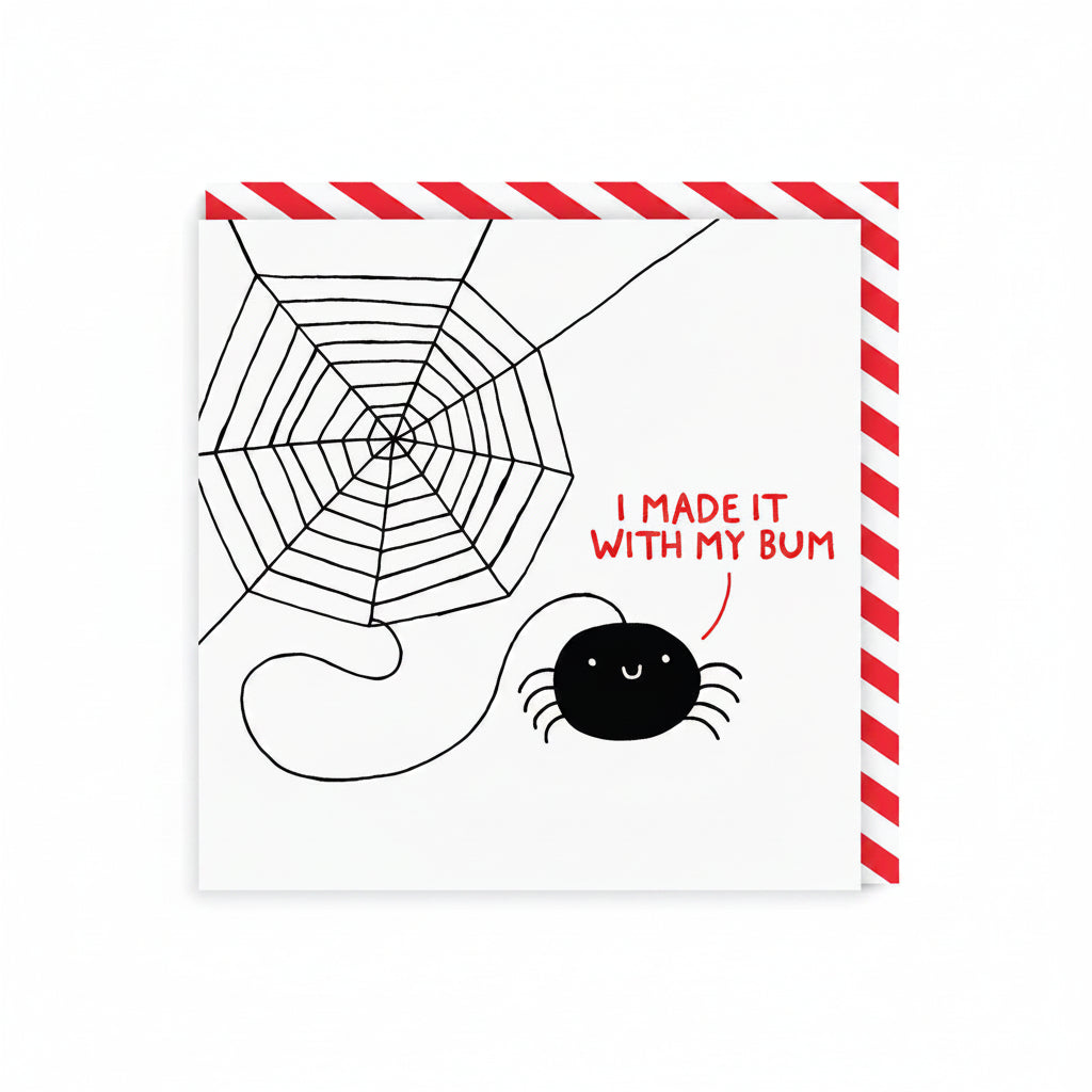 White square card with a hand-drawn spider web and a smiling black spider