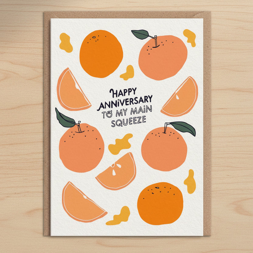 Greeting card with orange illustrations and text on a white background