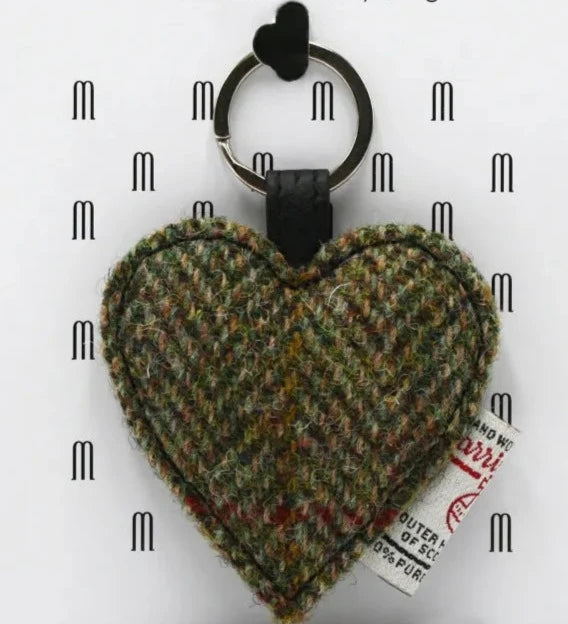 Country green Harris Tweed heart keyring on patterned Maccessori background