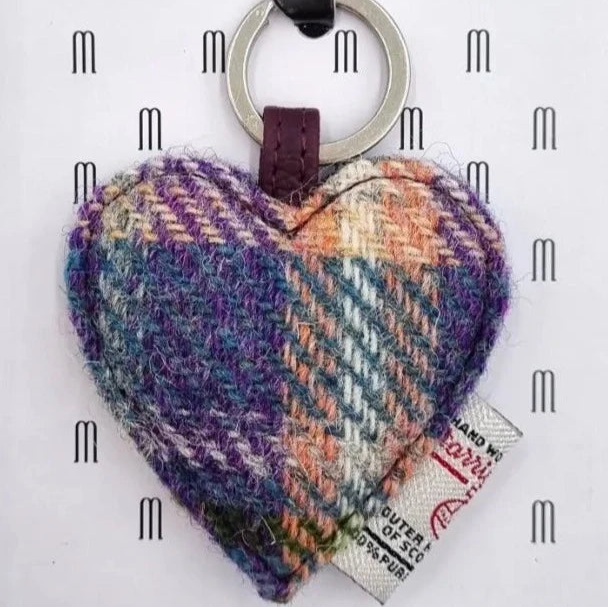 Green and purple tartan Harris Tweed heart keyring on patterned Maccessori card