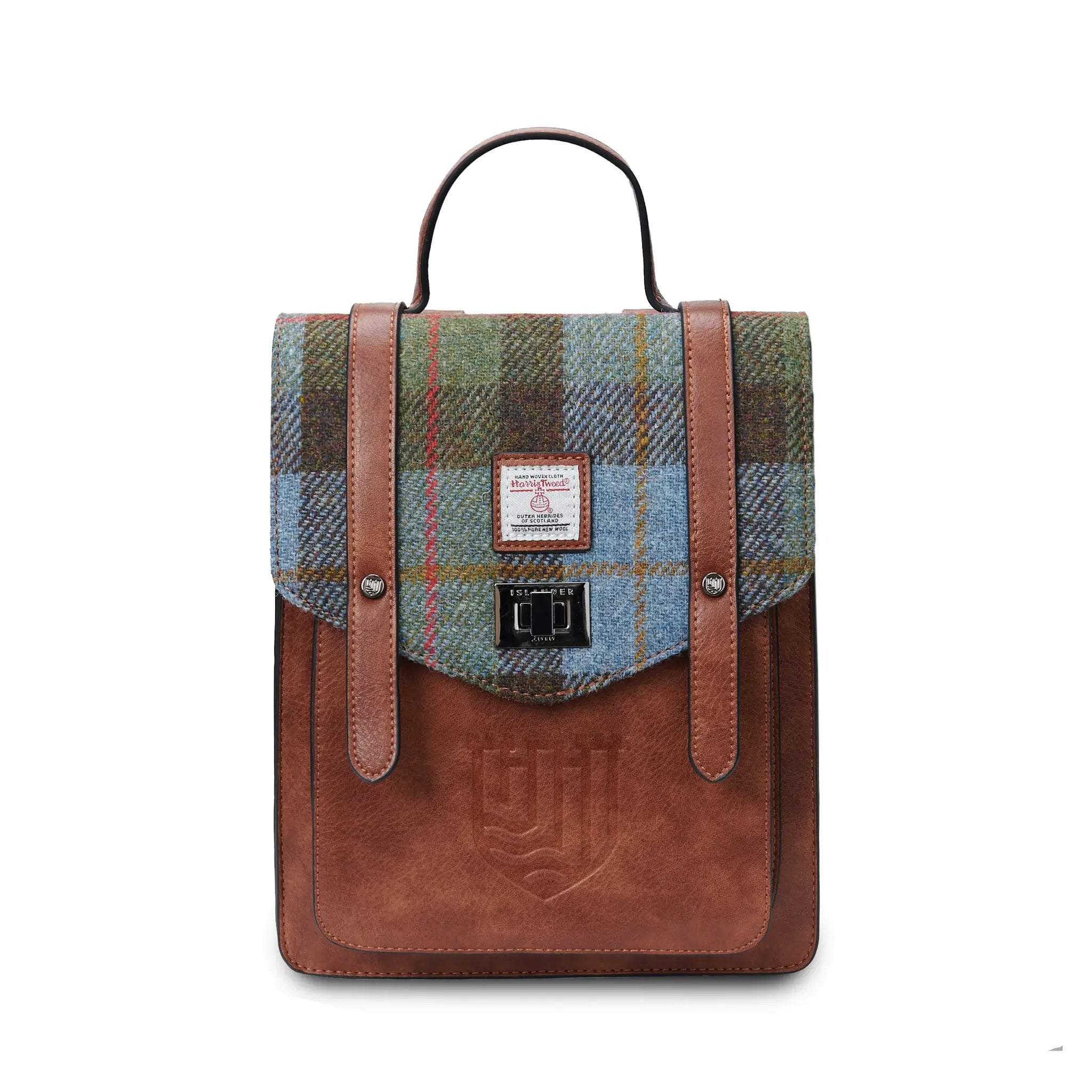 Durable construction ensures the Mini Carloway Backpack will be your trusty companion for years to come. In chestnut & Blue Tartan.