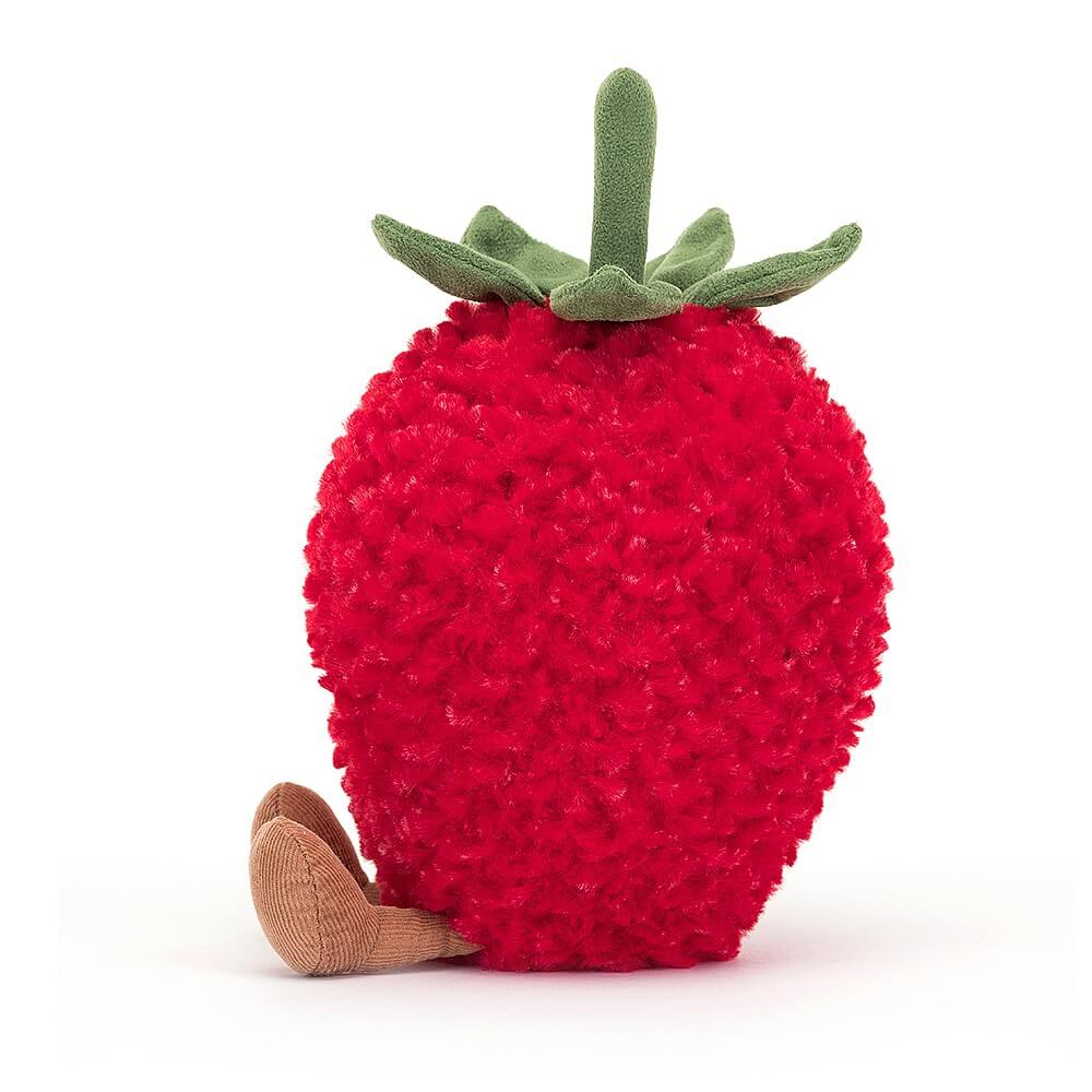 From the side the Jellycat Amuseable Strawberry has his little legs sticking out in front. 