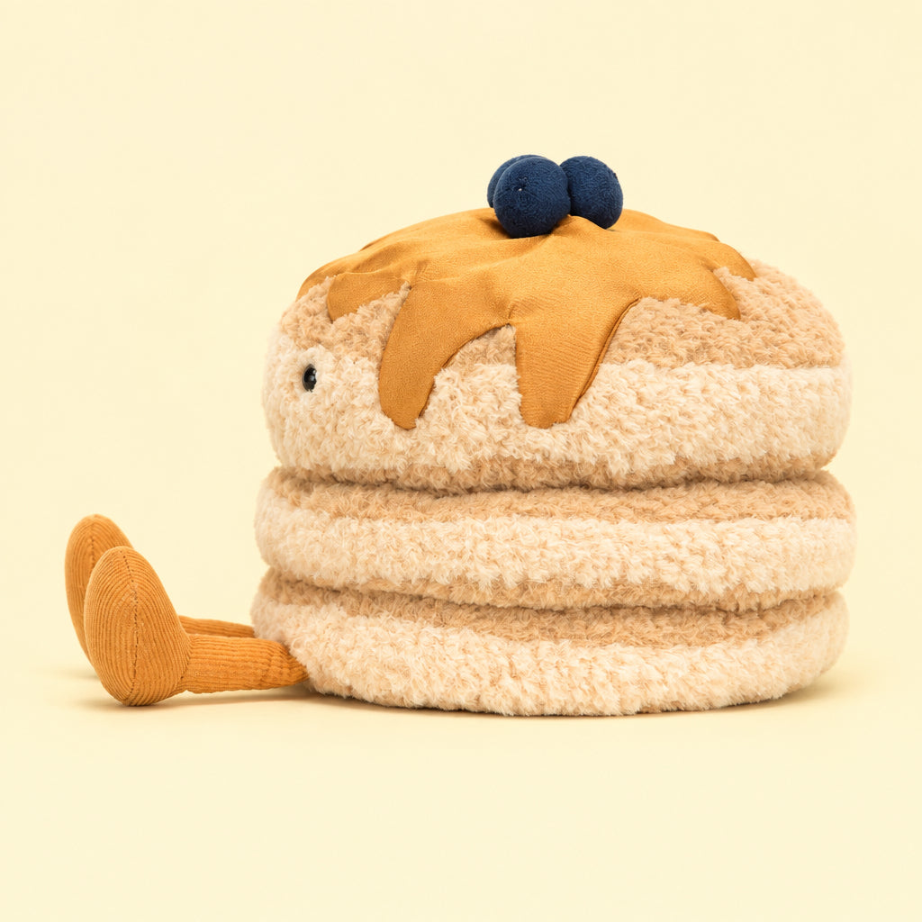 Side view of Jellycat Amuseables Fran Pancakes showing plush pancake layers and syrup details.