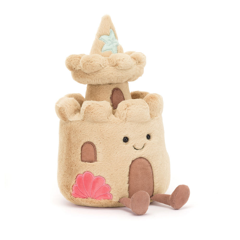Front view of Jellycat Amuseables Sandcastle plush toy with smiling face, embroidered pink shell, and corduroy legs.