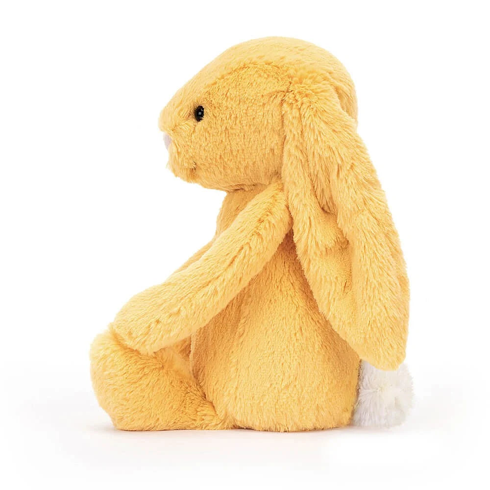 Jellycat Bashful Sunshine Bunny side view showing golden fur on white background