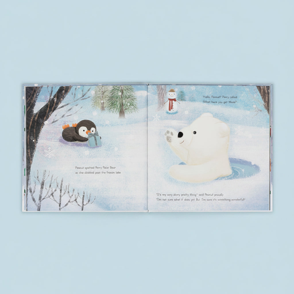 Open pages of Peanut Penguin’s Perfect Present showing Peanut sliding across a frozen lake with a polar bear illustration.