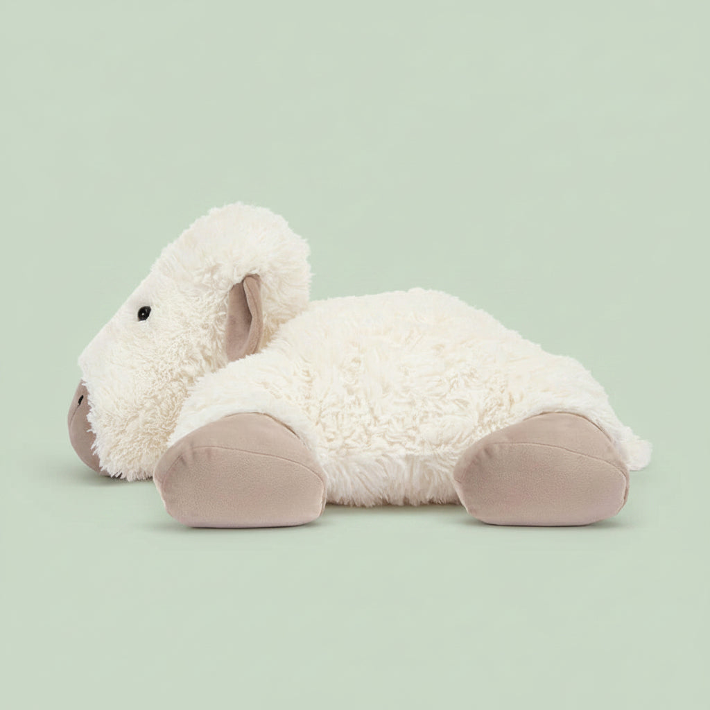 Side view of Jellycat Large Truffles Sheep, showing its soft and fluffy texture.
