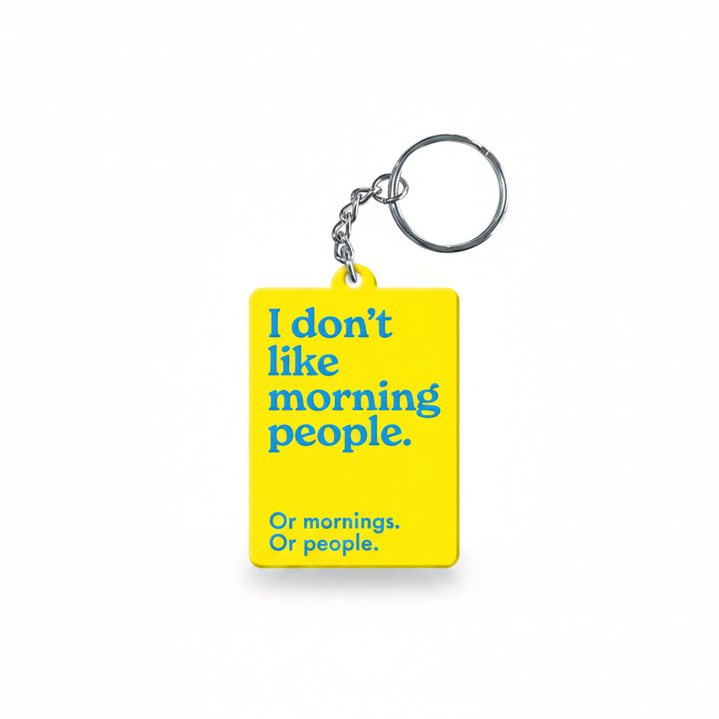 Yellow keyring reading I don't like morning people, or mornings, or people