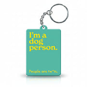 Green keyring reading I'm a dog person, people are twats