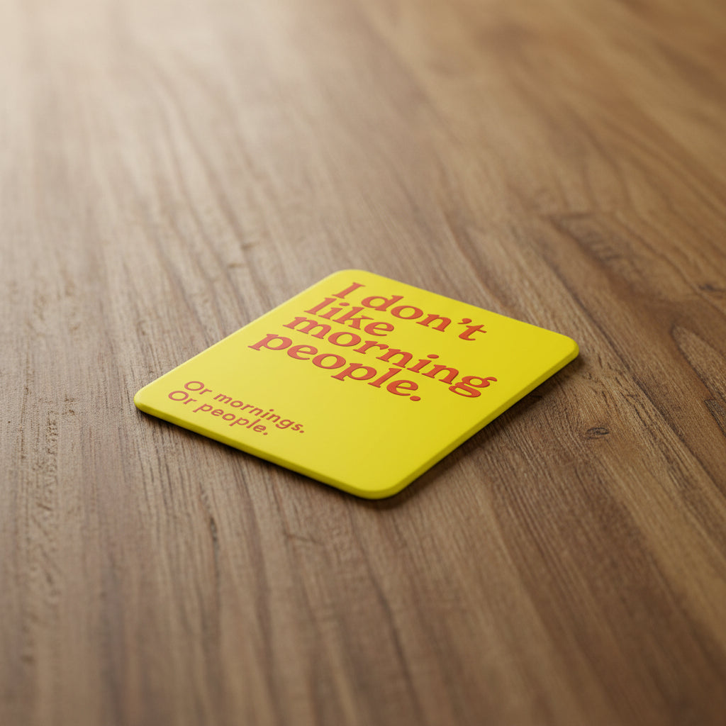 Yellow coaster with red text saying 'I don't like morning people. Or mornings. Or people.'