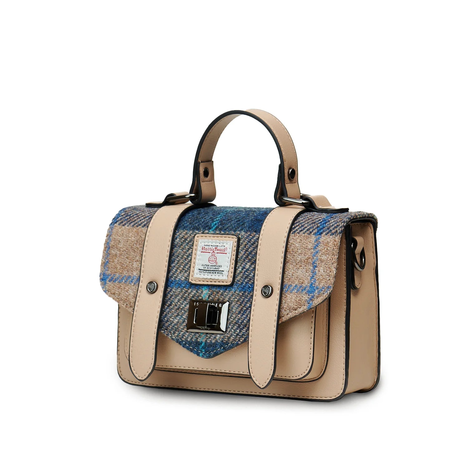 Side view of navy and beige Harris Tweed satchel with top handle.
