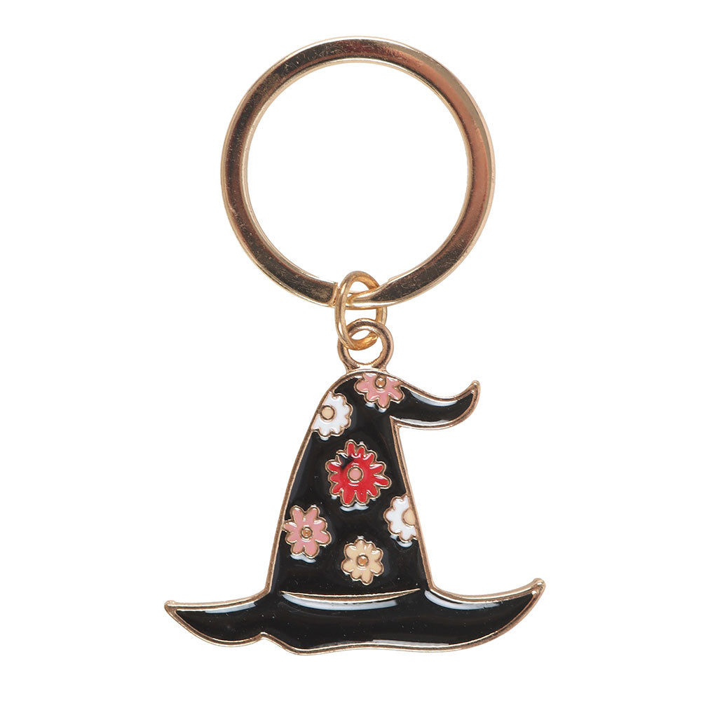 Floral enamel witch hat keyring showing gold detailing and pastel flowers