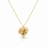 Gold-plated heart locket necklace featuring a hand-painted enamel design of two swallows and pink flowers on a fine chain.