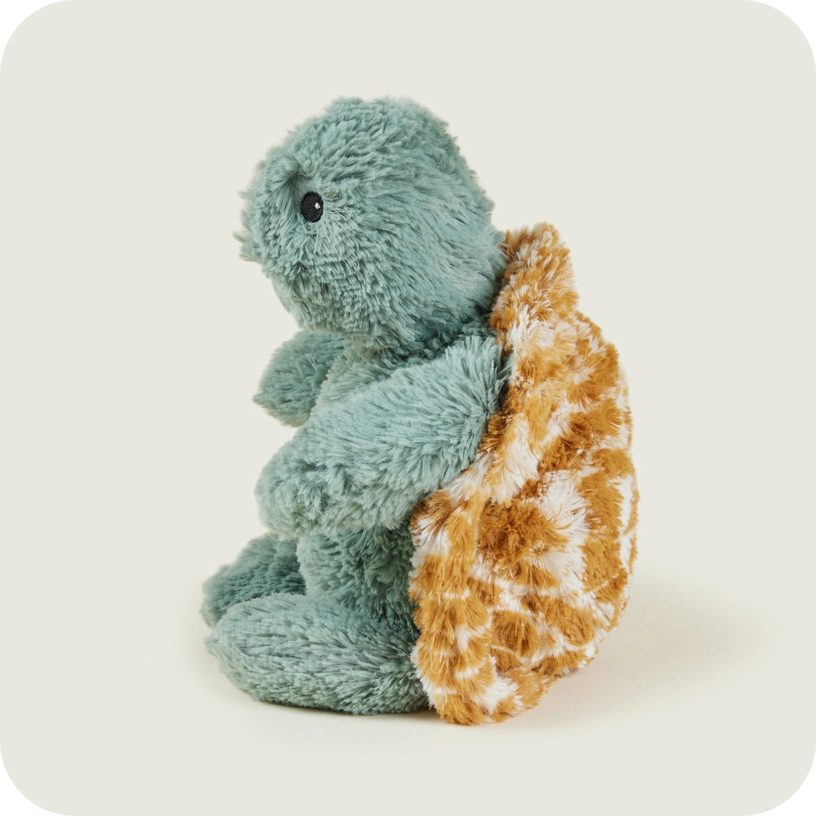 Warmies Baby Turtle profile view highlighting soft texture and detailed shell.