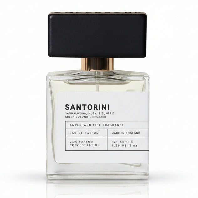 Santorini eau de parfum bottle with black cap, front view on cream background