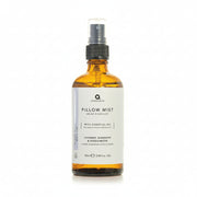 Aroma Home Sleep Well pillow mist in an amber glass bottle on a white background
