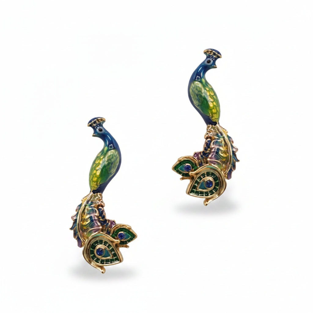 Blue and green enamel peacock stud earrings on white background