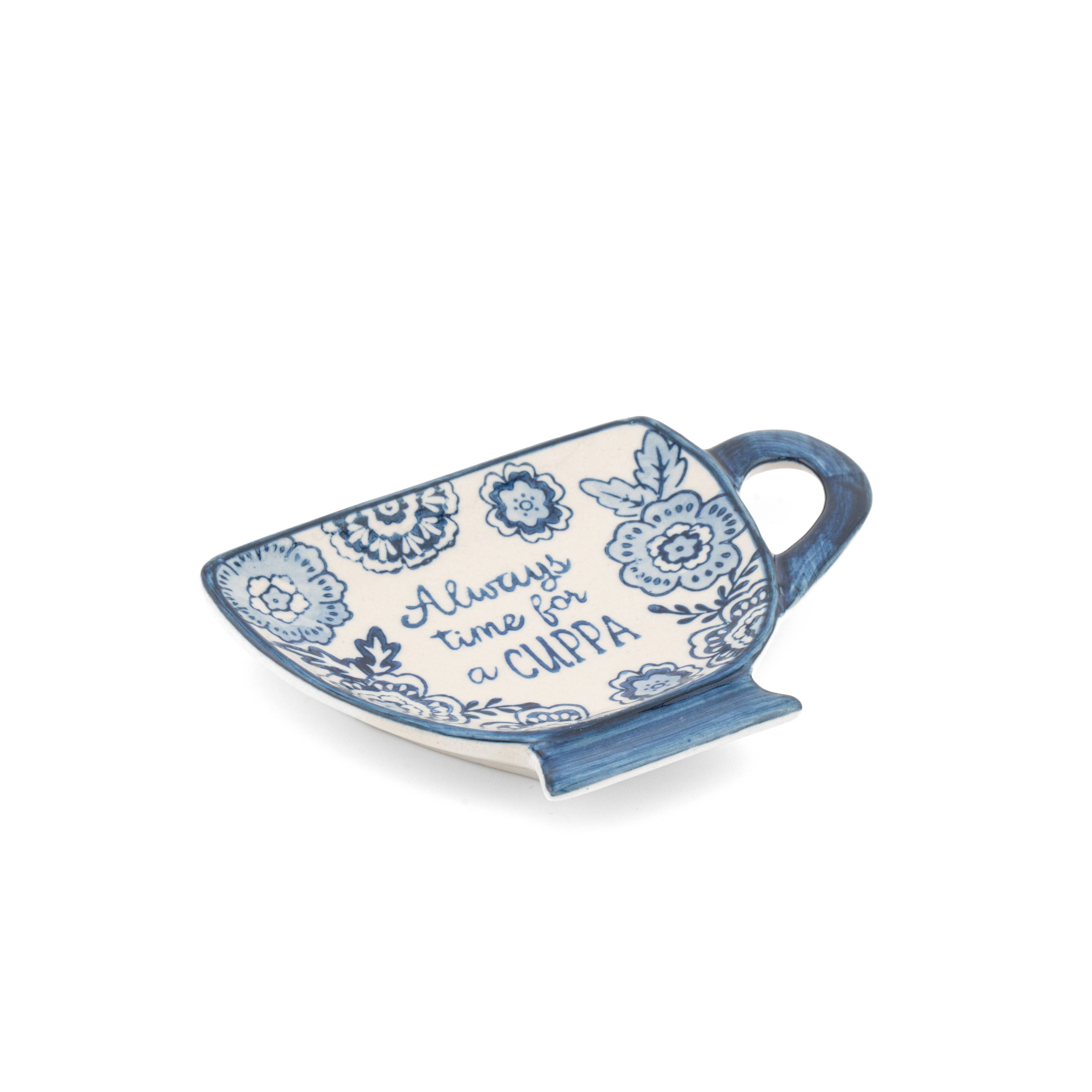 Close up detail of blue willow pattern on ceramic teabag dish
