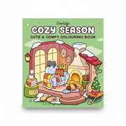 Cozy Season cover with a snowy fireplace and cosy living room scene