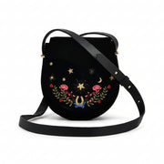 Black Dove and Floral Star Velvet Embroidered Saddle Bag embroidery close-up showing dove and floral star details