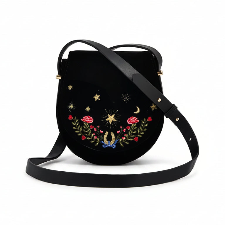 Black Dove and Floral Star Velvet Embroidered Saddle Bag embroidery close-up showing dove and floral star details