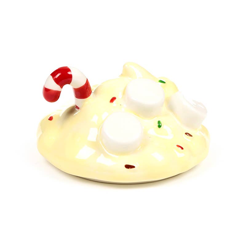 Cream ceramic lid shaped like whipped cream with candy cane and marshmallows.