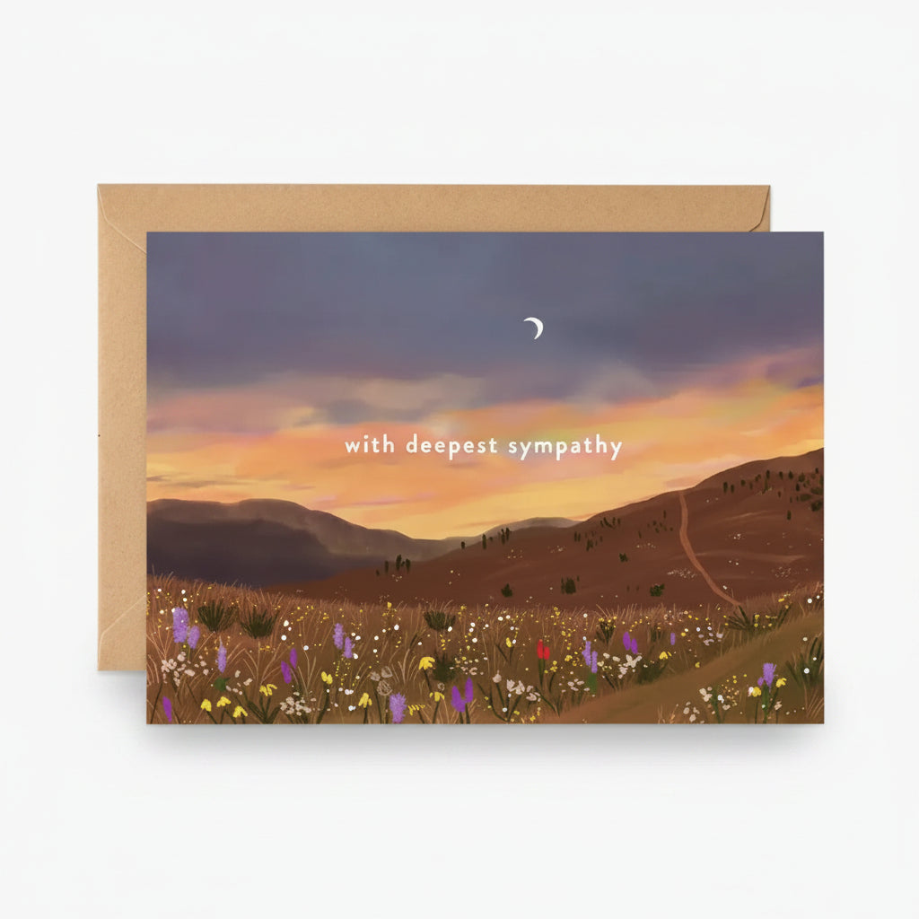Greeting card with a sunset over a field and 'with deepest sympathy' text.