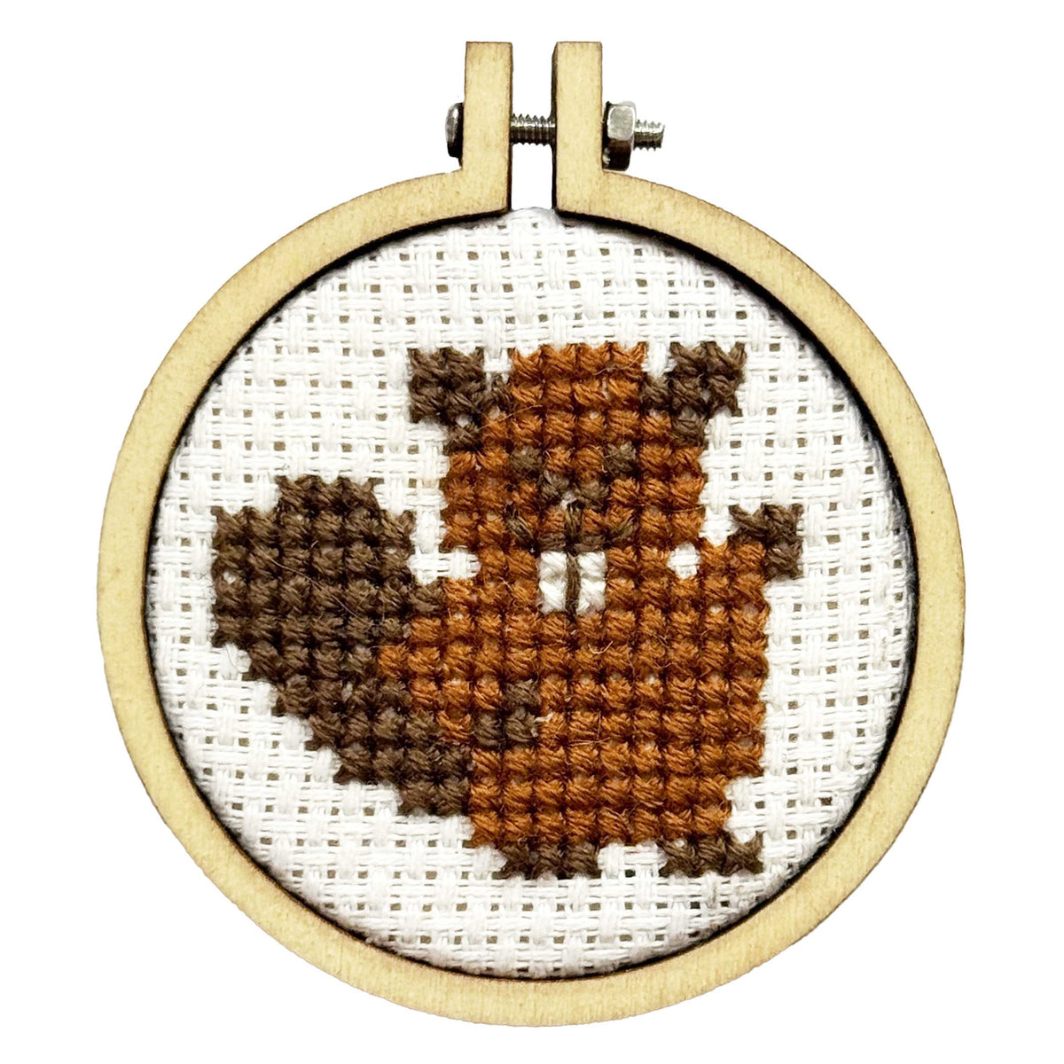Finished brown beaver cross stitch in a 5cm wooden hoop on white