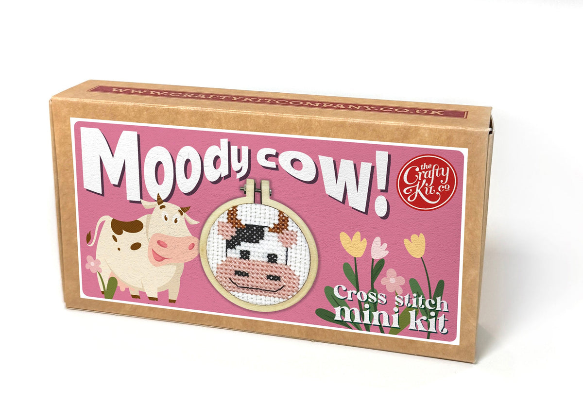 Moody Cow matchbox cross stitch kit box on a white background