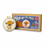 Och Aye The Moo cross stitch kit and finished Highland cow hoop on green