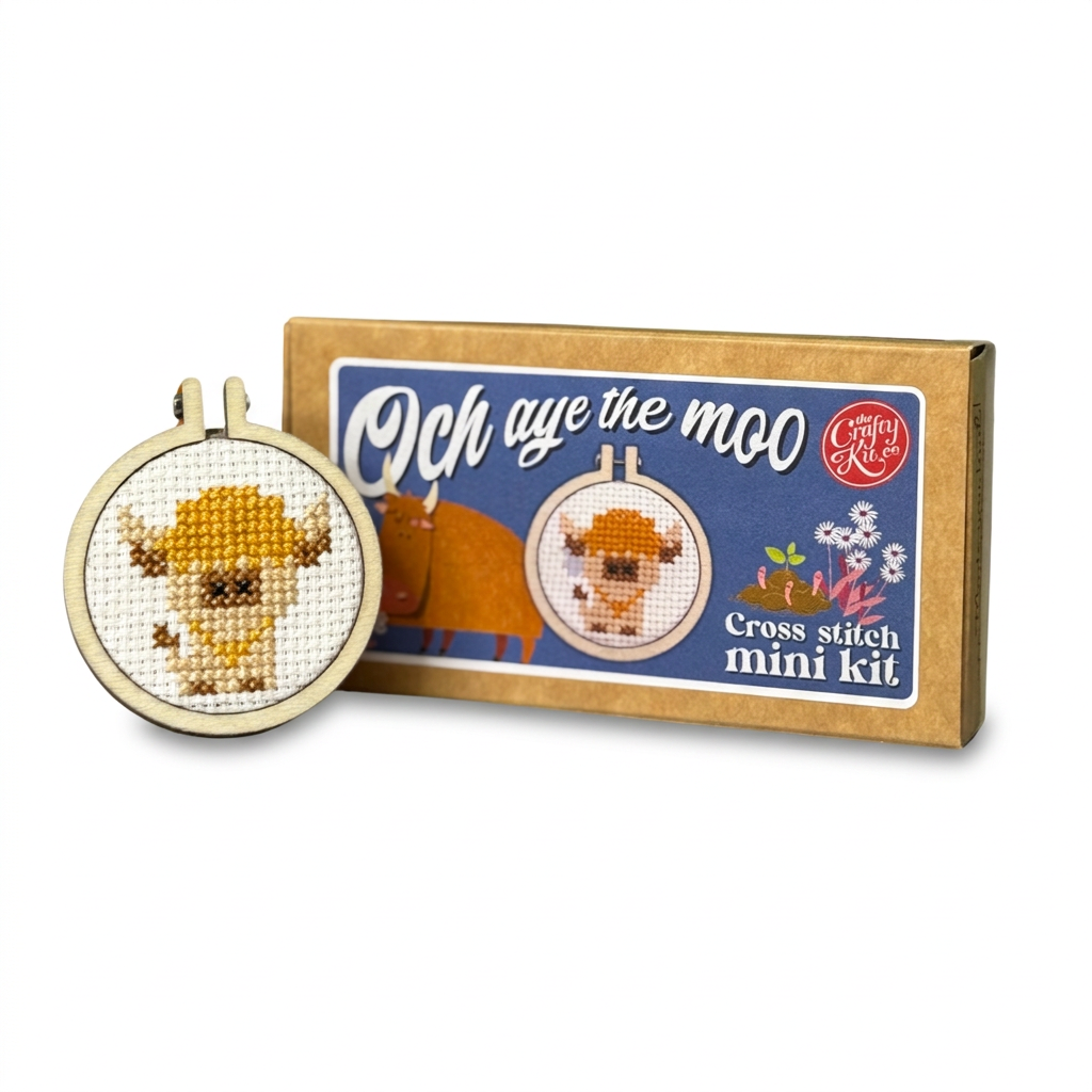 Och Aye The Moo cross stitch kit and finished Highland cow hoop on green