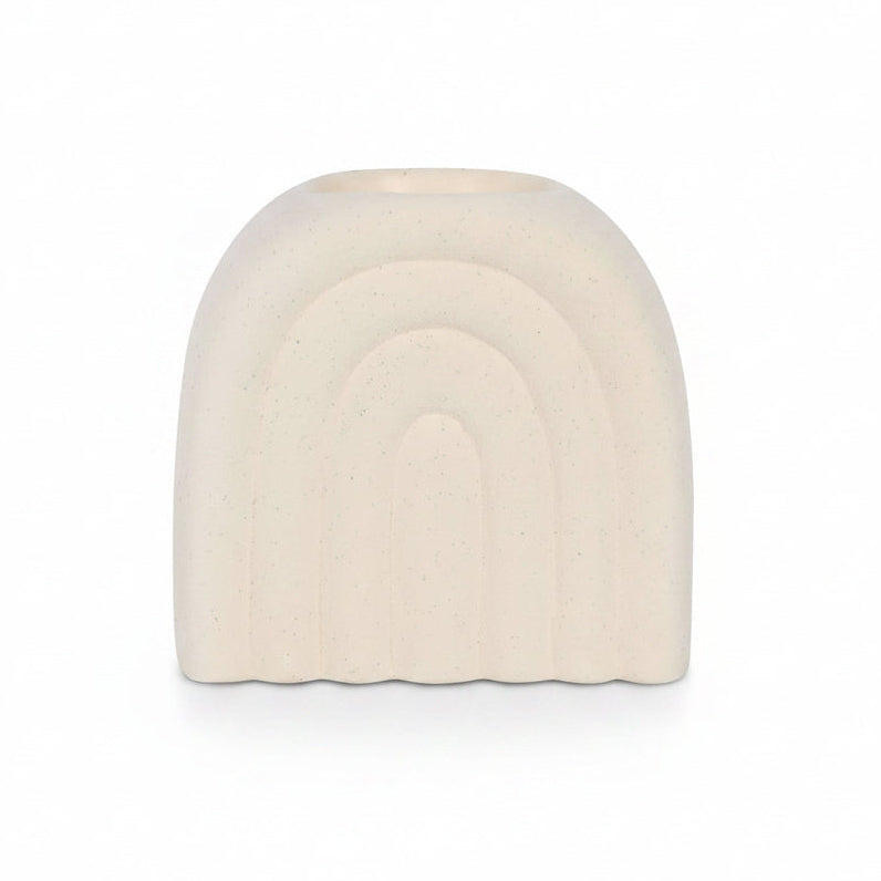 Arch shaped oil burner showing cream speckled texture