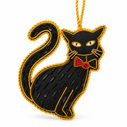 Fancy Black Cat embroidered decoration close up, showing the red bow and gold metal outline