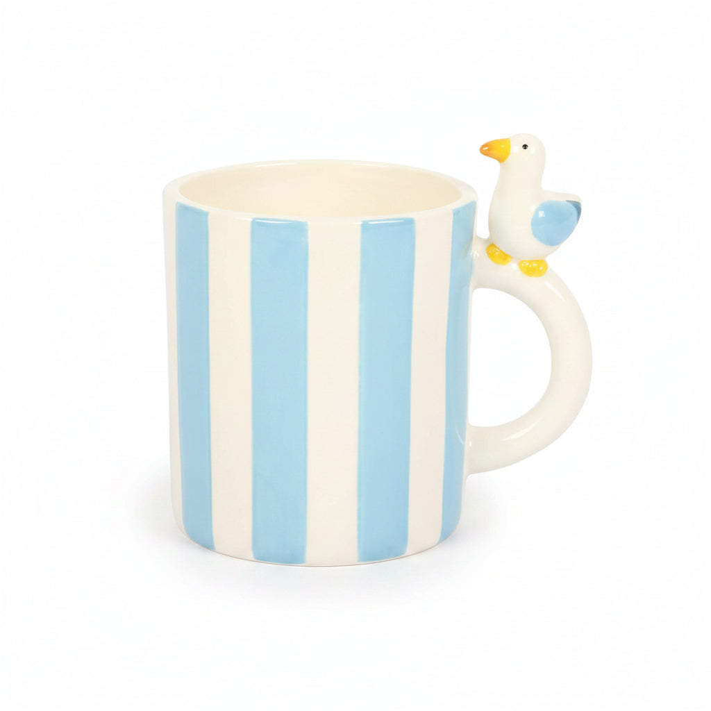 Blue and white striped mug with perched seagull handle on white background