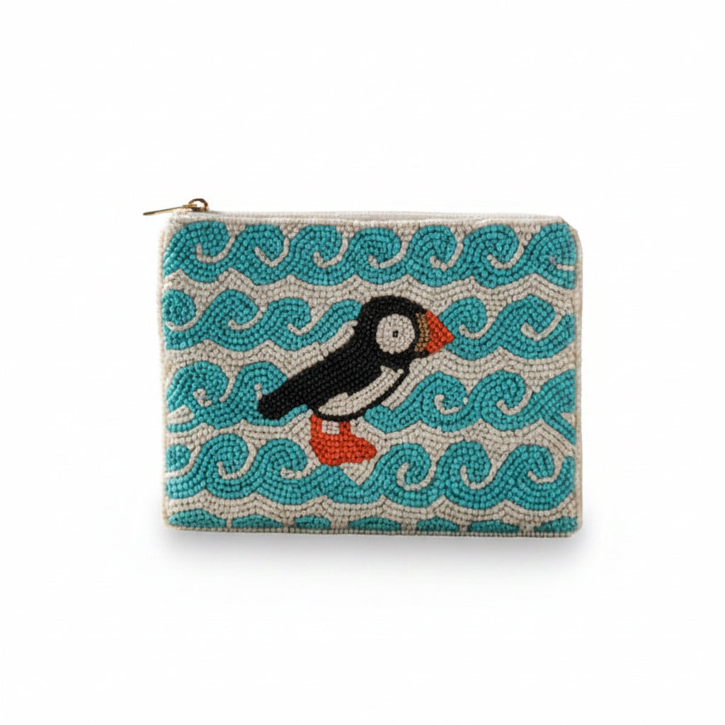 Puffin beaded purse with teal background and coastal rock design