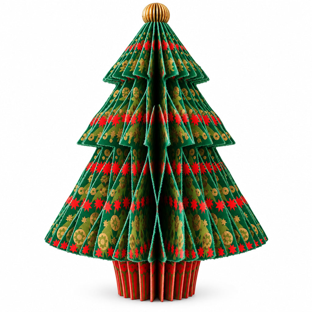 A handmade felt Christmas tree ornament with a green base, red and gold patterned layers, and a small wooden topper, displayed on a wooden table in a warm living room setting.